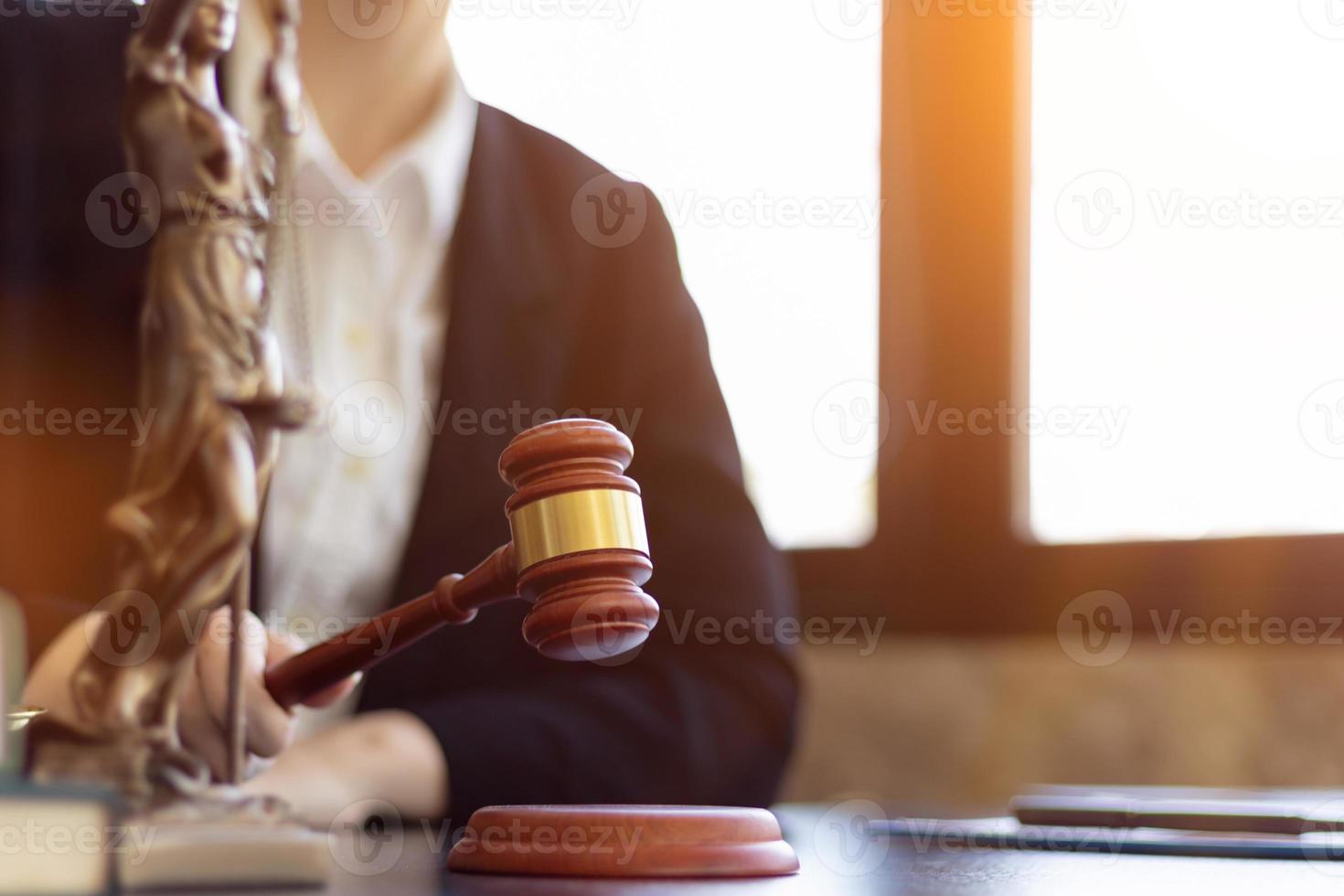 wooden judge gavel on table as symbol of justice for use in legal cases judicial system and civil rights and social justice concept with judge. concept of legislation to judge lawsuits with justice. photo