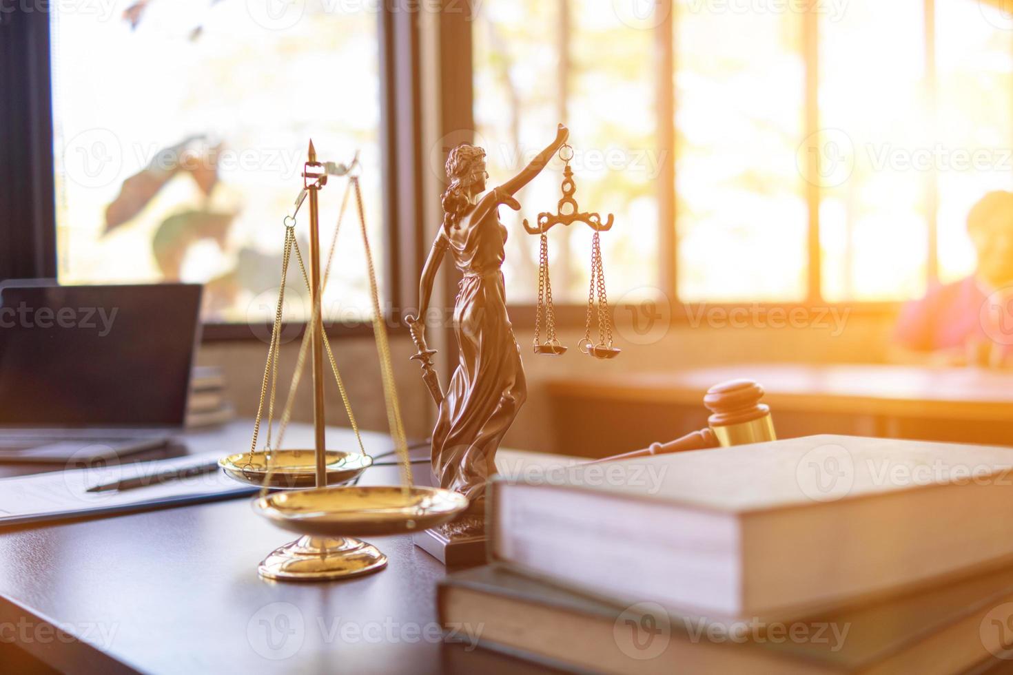 Brass court scales are used to decorate a table in a legal advisor