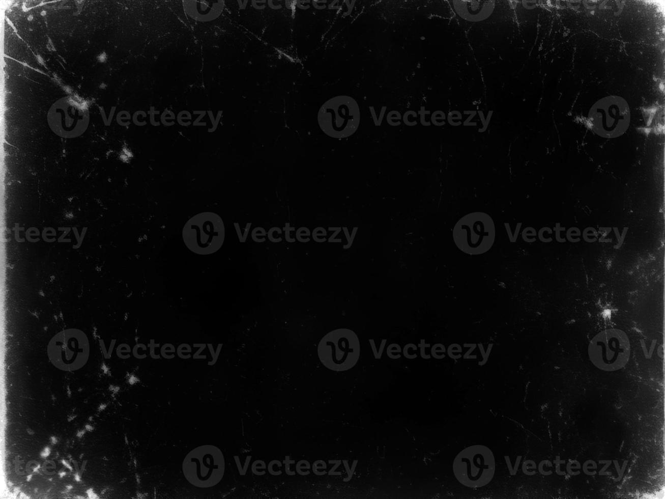 Distressed Black Scratched Texture with Old Film Effect - Grunge Monochrome Background for Design and Art - Vintage Aged Backdrop photo