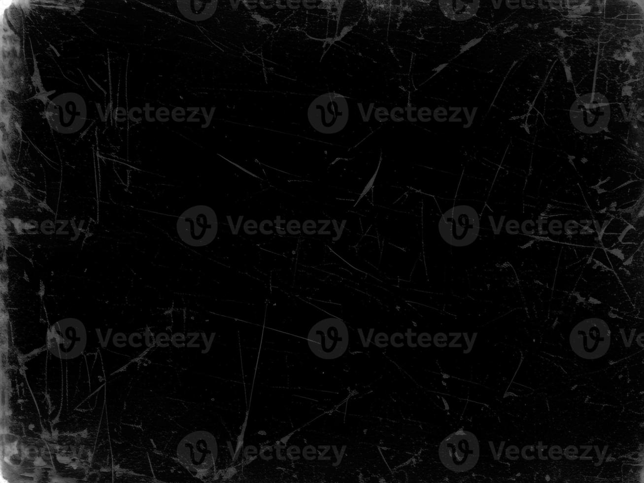 Distressed Black Scratched Texture with Old Film Effect - Grunge Monochrome Background for Design and Art - Vintage Aged Backdrop photo