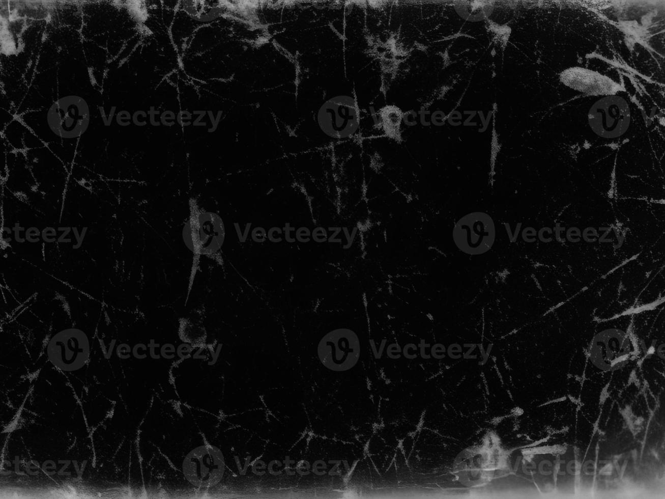 Distressed Black Scratched Texture with Old Film Effect - Grunge Monochrome Background for Design and Art - Vintage Aged Backdrop photo