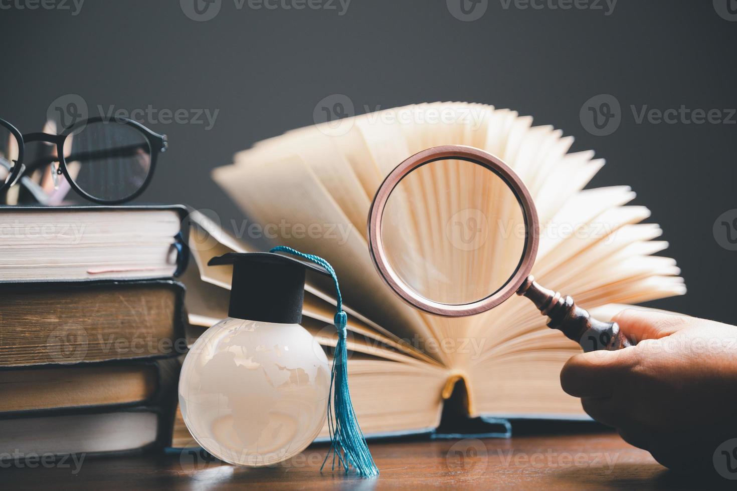 Graduation cap with Earth globe. Concept of global business study, abroad educational, Back to School. Education in Global world, Study abroad business in universities in worldwide. language study photo