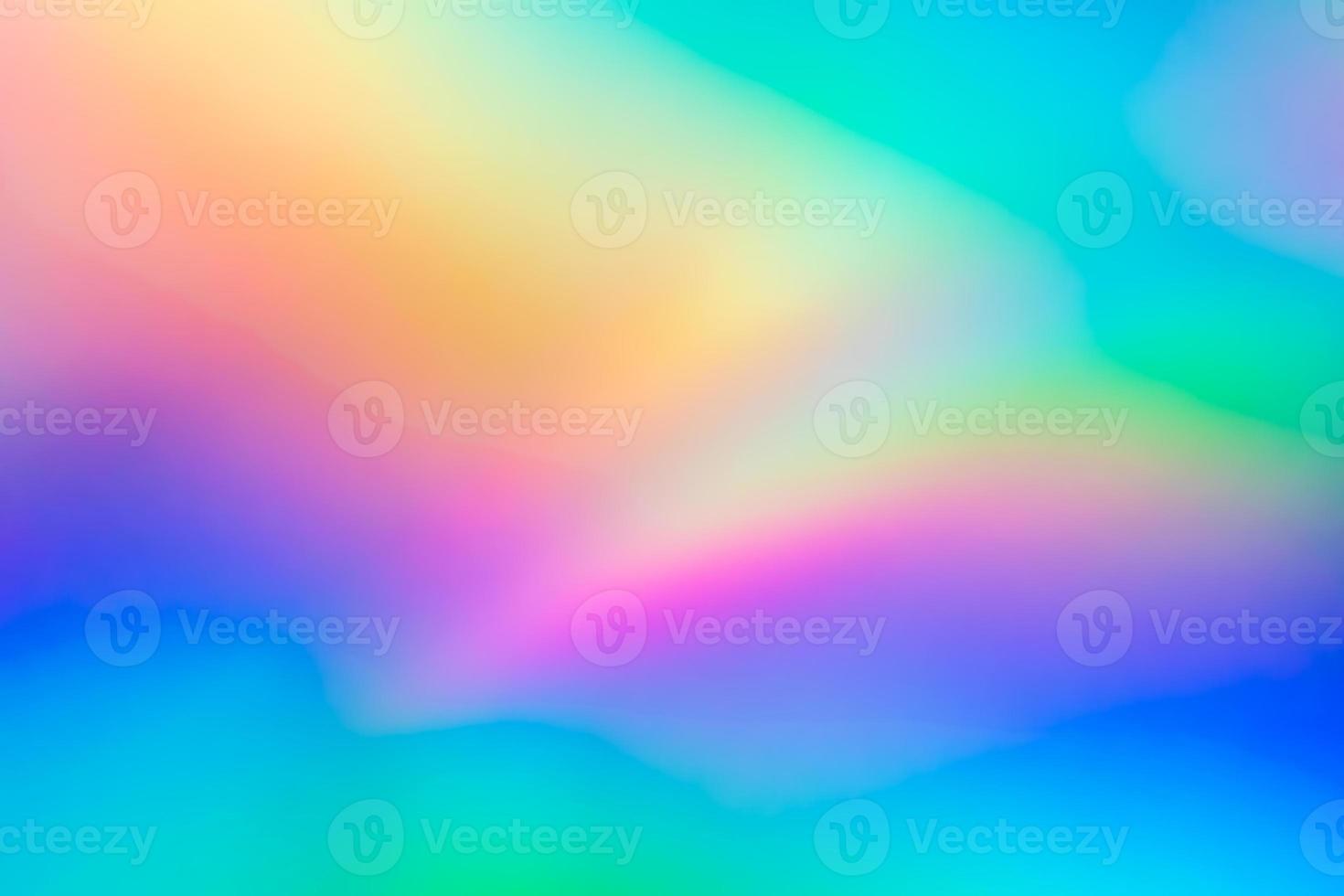 Abstract blur holographic rainbow foil iridescent background photo