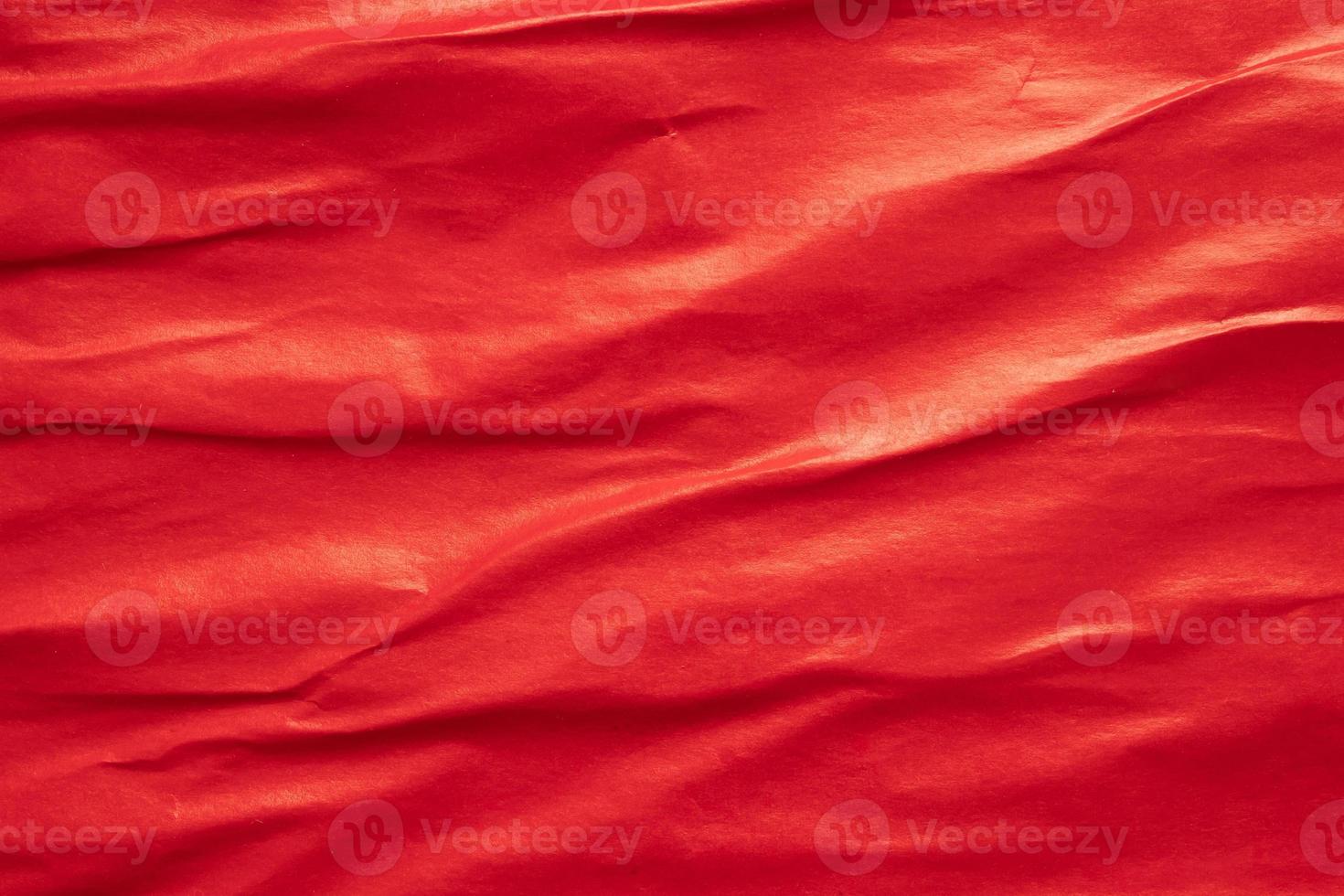 Blank red crumpled and creased paper poster texture background photo