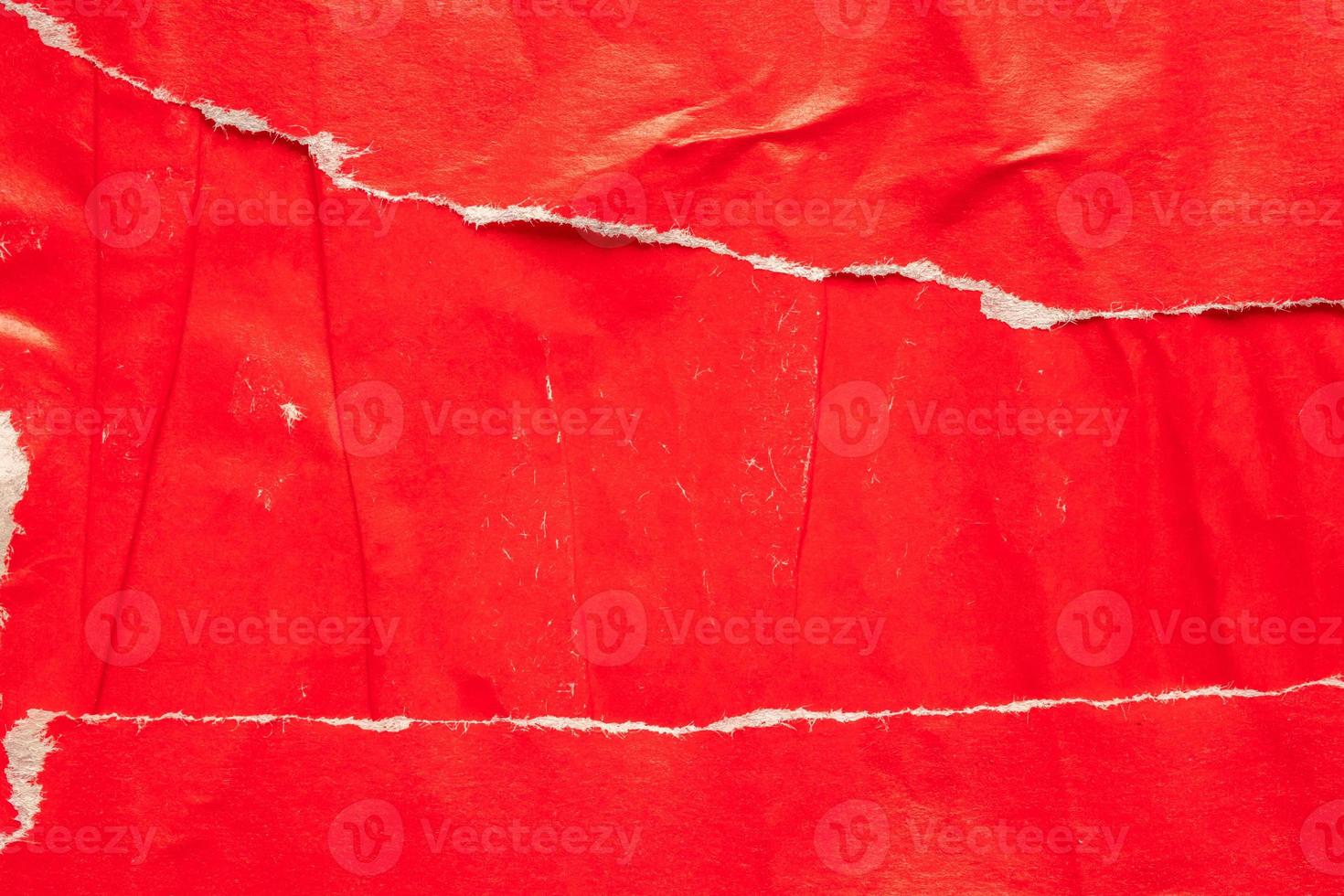 Old grunge ripped torn red paper poster surface texture background photo