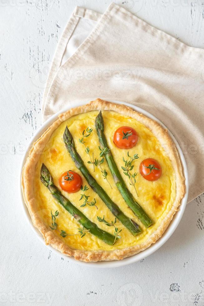 Open pie with asparagus photo