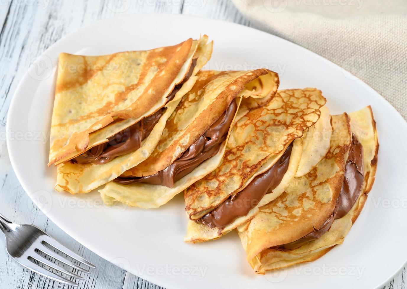 Crepes with chocolate cream photo