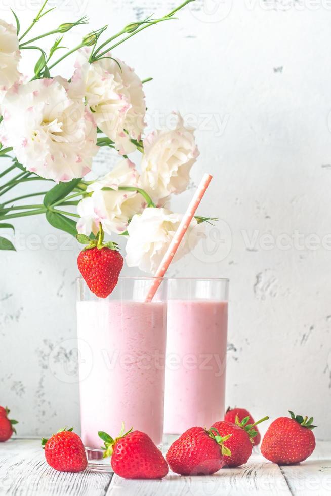 Two glasses of strawberry shake photo