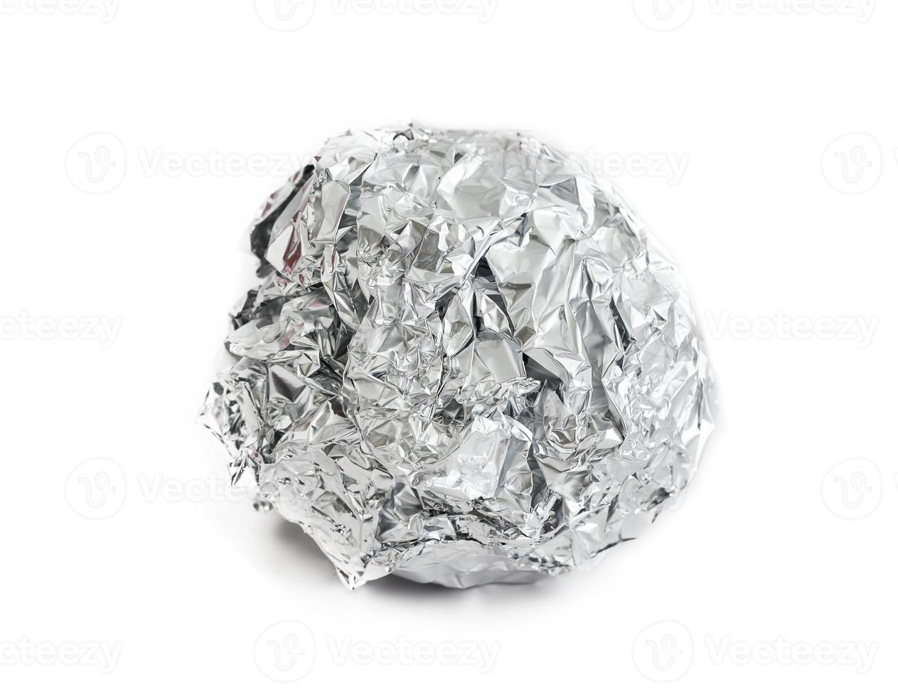 aluminium foil paper ball food grade isolated on white background. object aluminium foil paper ball food grade isolated on white background. aluminium foil paper ball food grade isolated photo