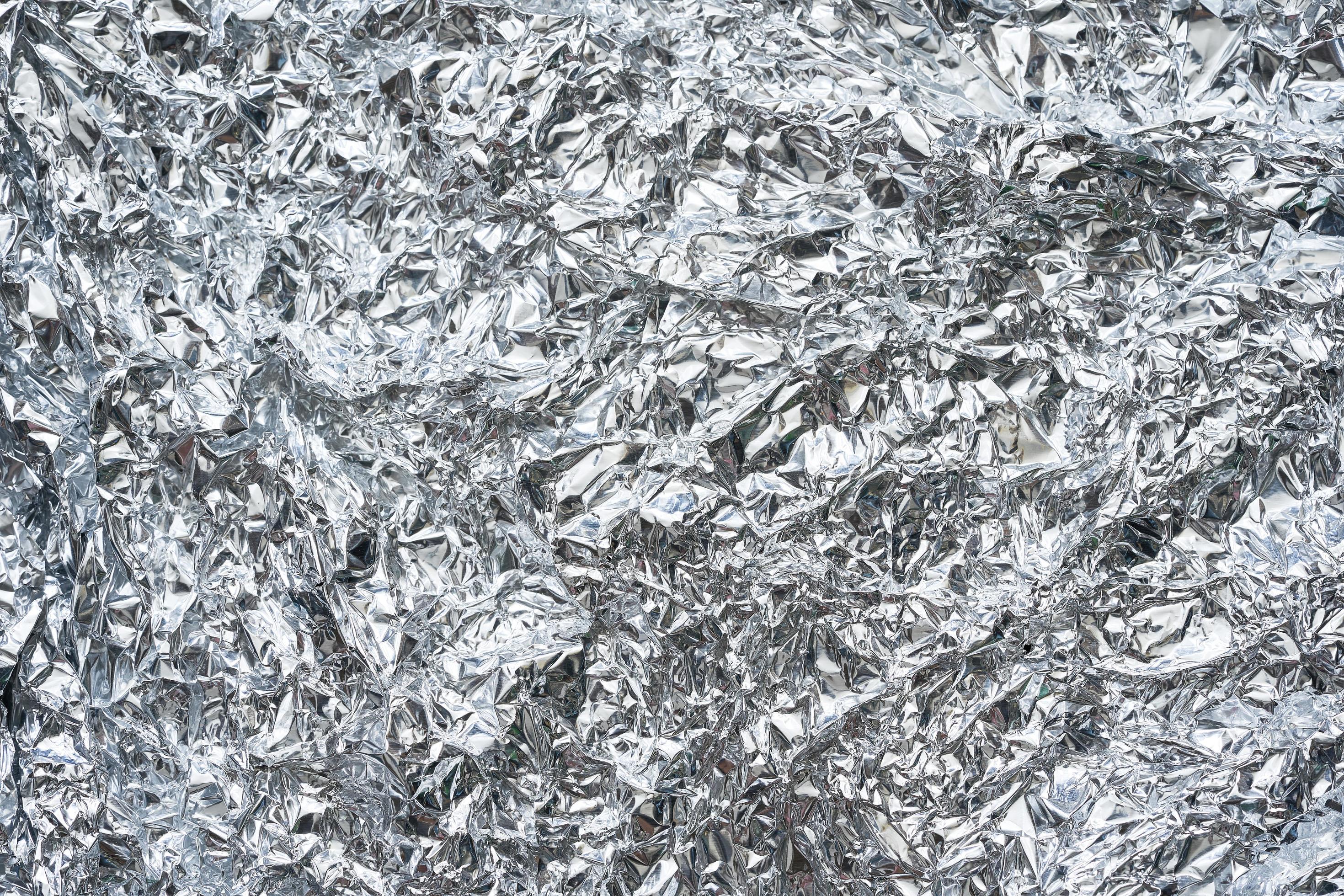 aluminium foil paper sheet texture background. abstract aluminium foil