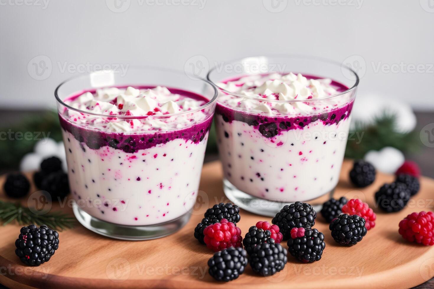 Strawberry yogurt in a white bowl.Yogurt with fresh blackberries, raspberries. photo