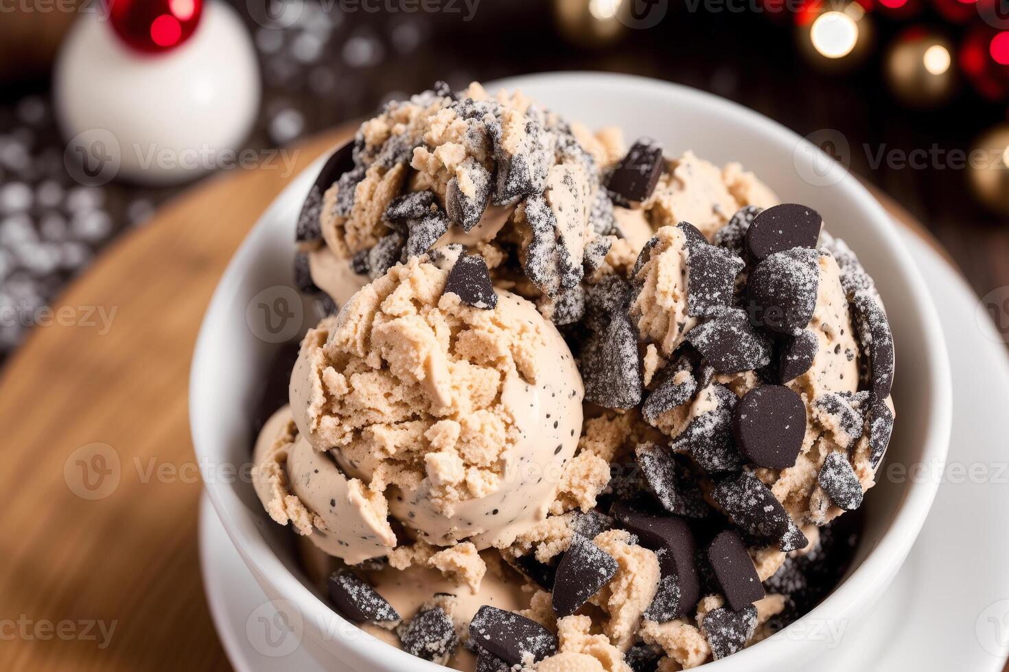 delicious Homemade ice cream with chocolate chips in a bowl on a wooden table. sweet food. photo