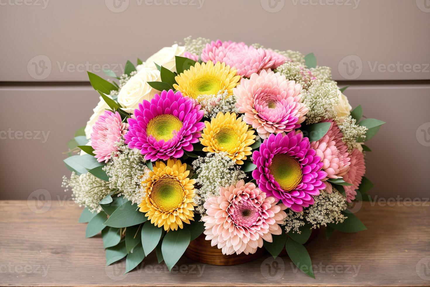 Bouquet of colorful flowers in vase on wooden background. photo