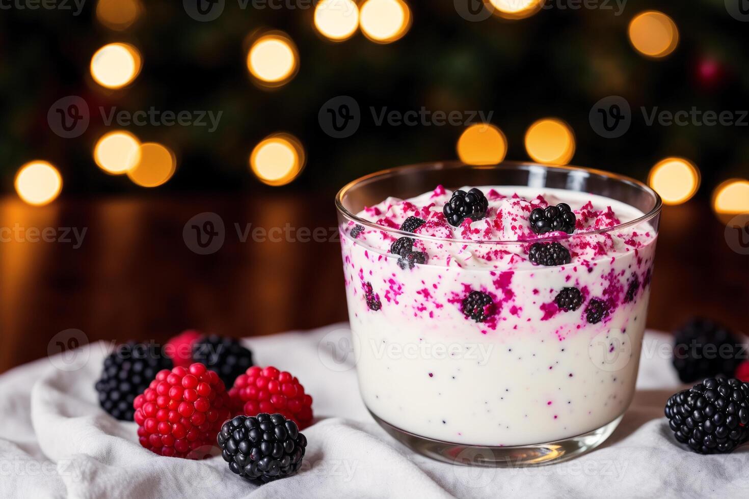 Strawberry yogurt in a white bowl.Yogurt with fresh blackberries, raspberries. photo