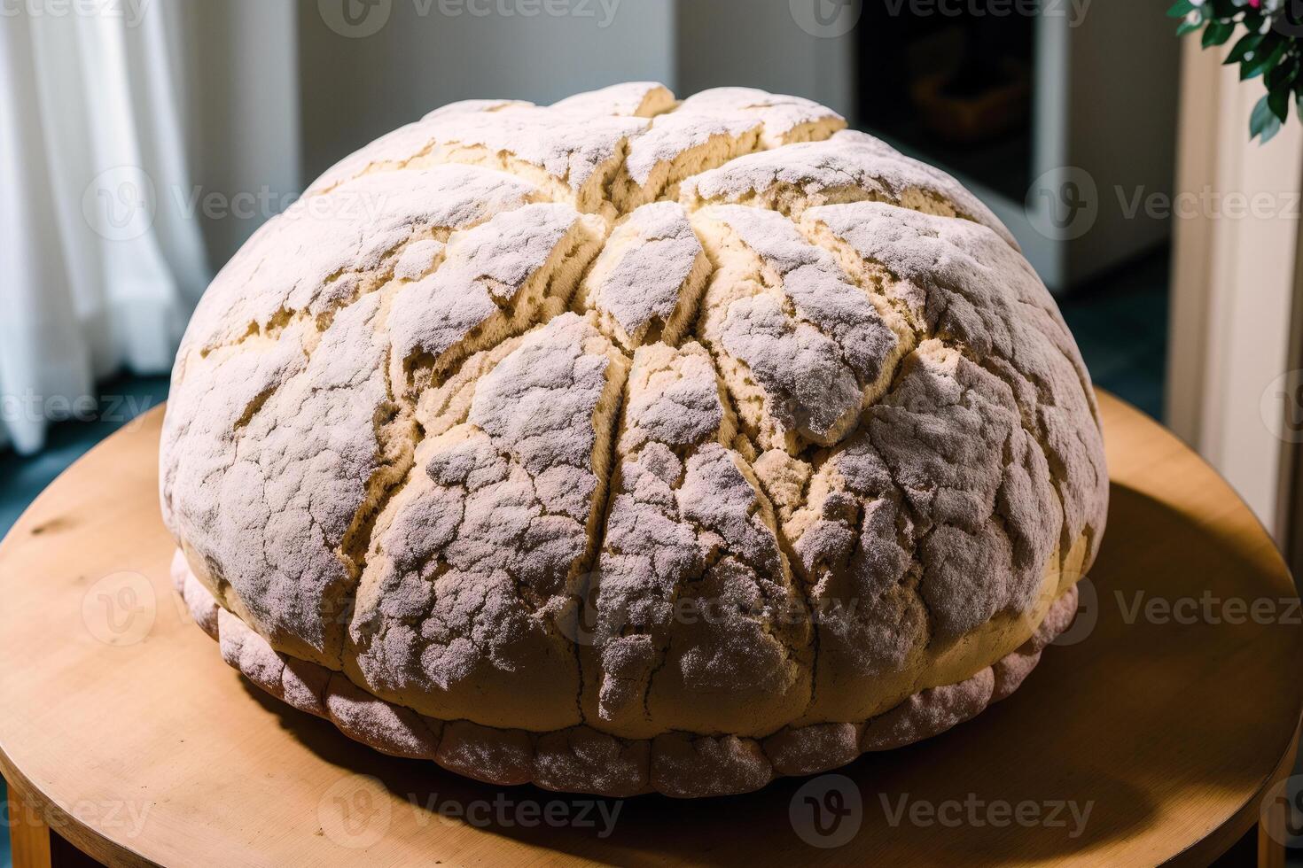 Freshly baked bread on a wooden board, close-up. French bread. loaf of white bread. photo