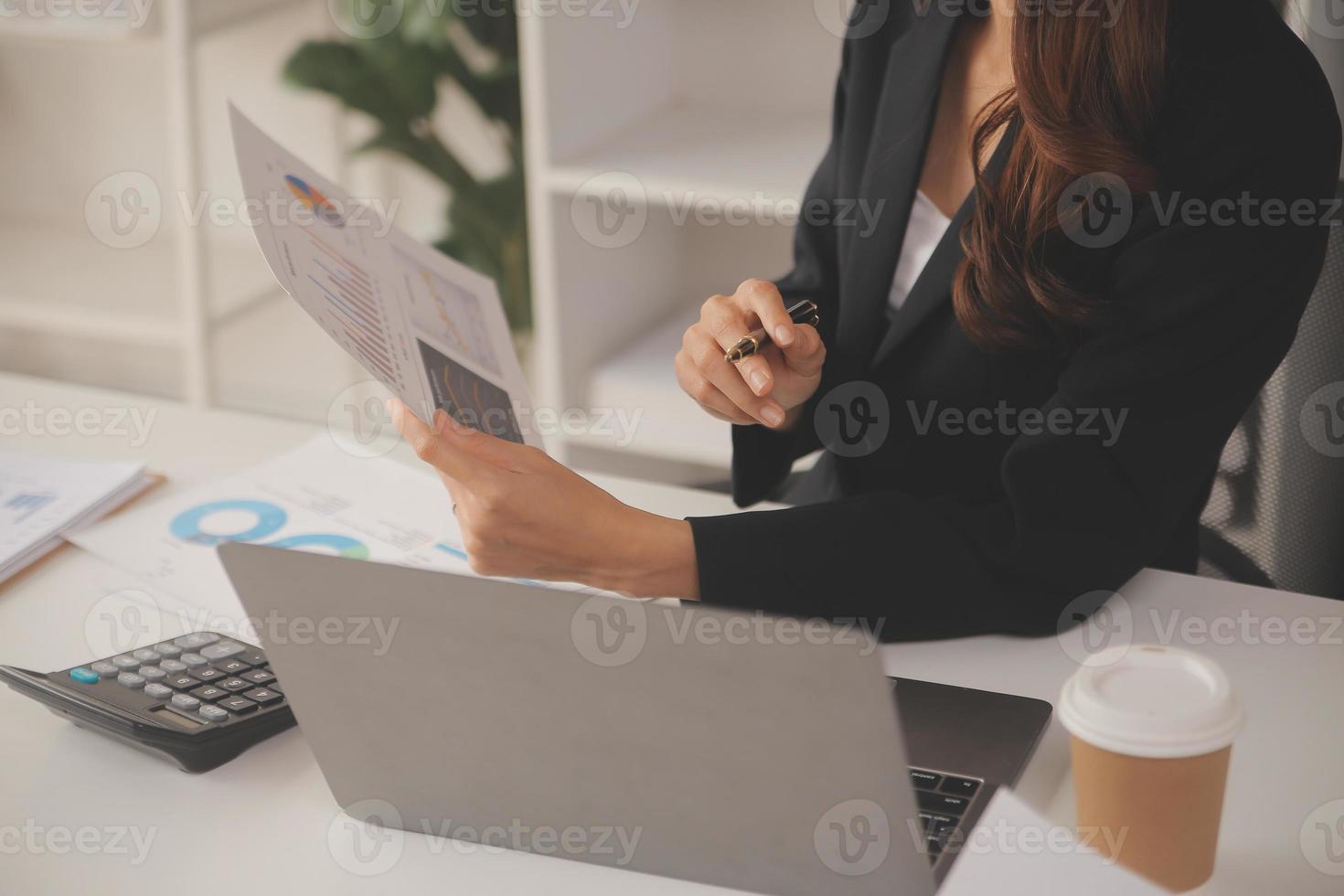 Business Documents, Auditor businesswoman checking searching document legal prepare paperwork or report for analysis TAX time,accountant Documents data contract partner deal in workplace office photo