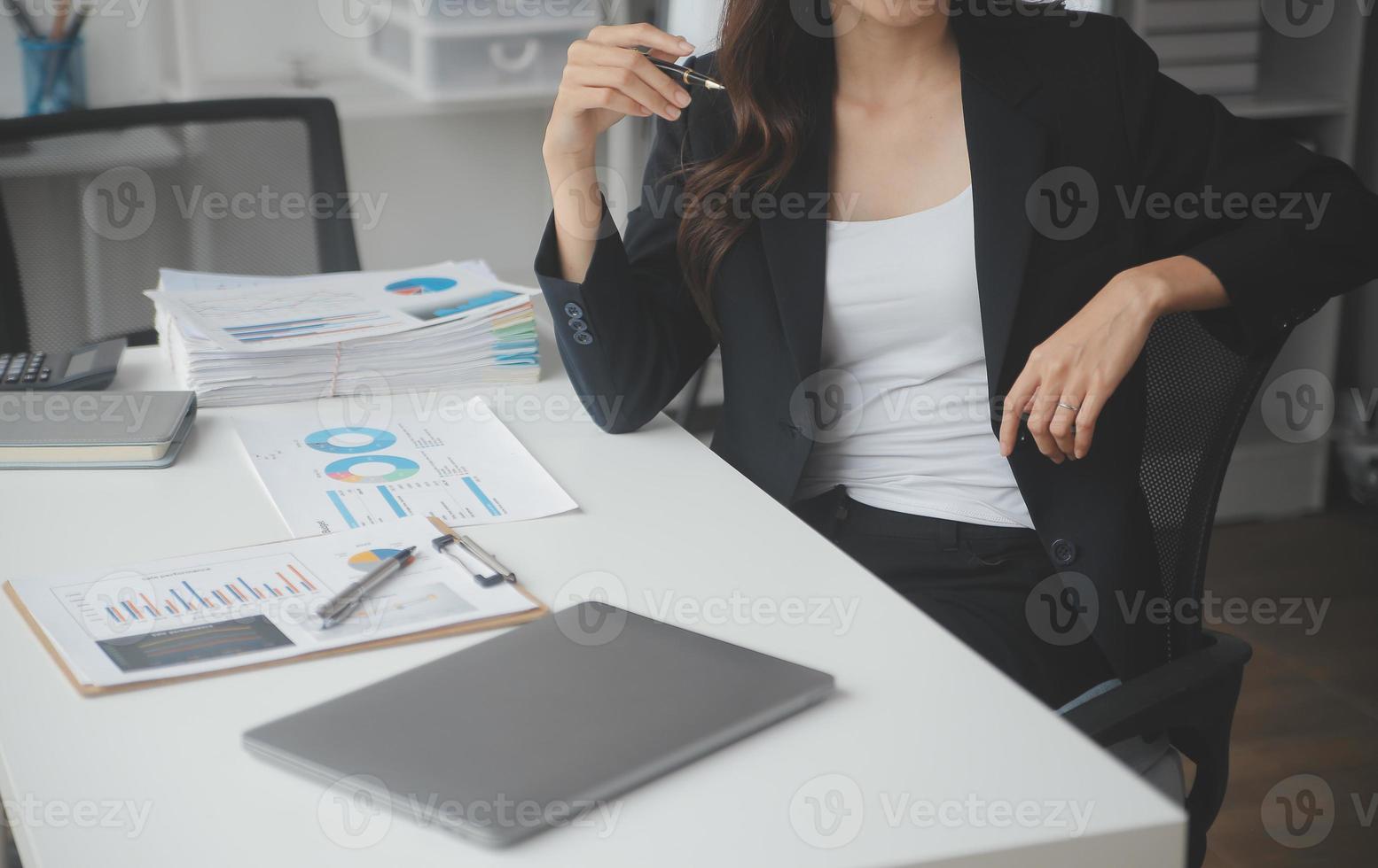 Business Documents, Auditor businesswoman checking searching document legal prepare paperwork or report for analysis TAX time,accountant Documents data contract partner deal in workplace office photo