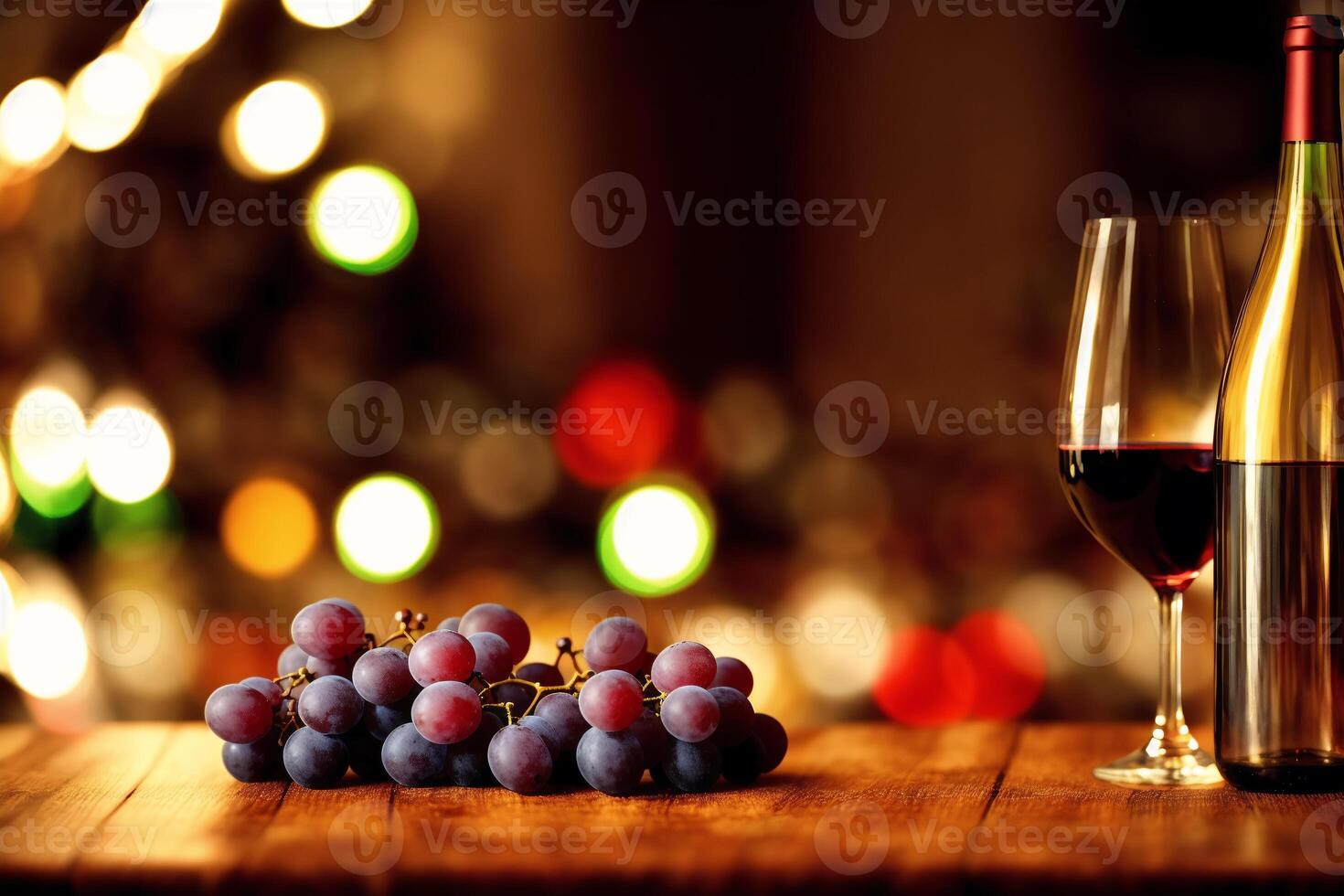 Glass of red wine and grapes on a wooden table.Bottle and glass of red wine with grapes. photo
