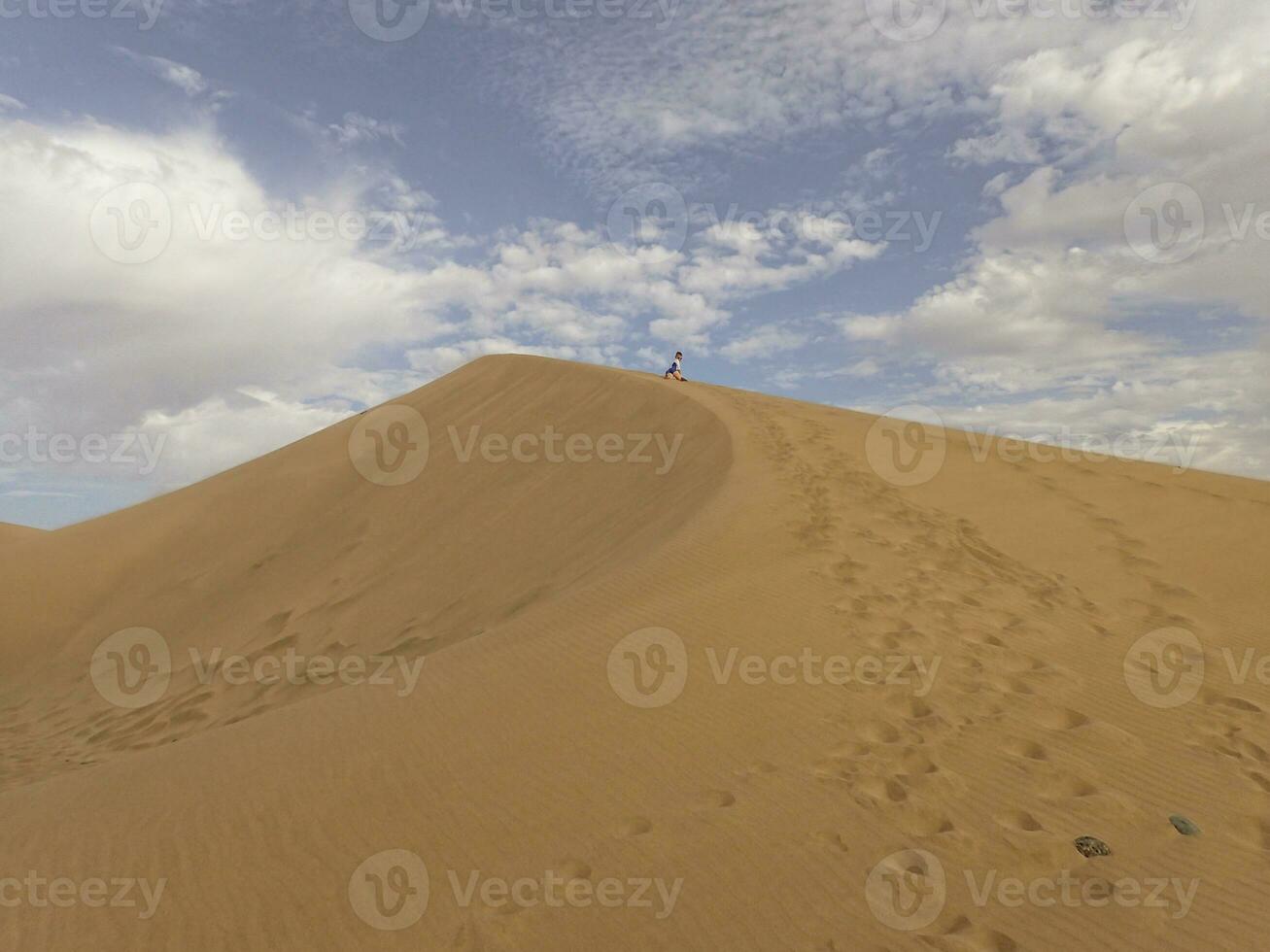 summer desert landscape on a warm sunny day from Maspalomas dunes on the Spanish island of Gran Canaria photo