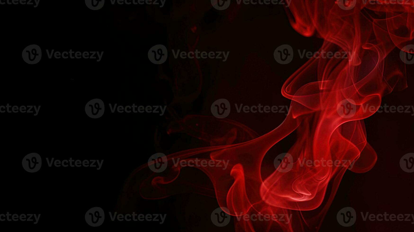 Red smoke on black background. Abstract colorful smoke on black background. photo