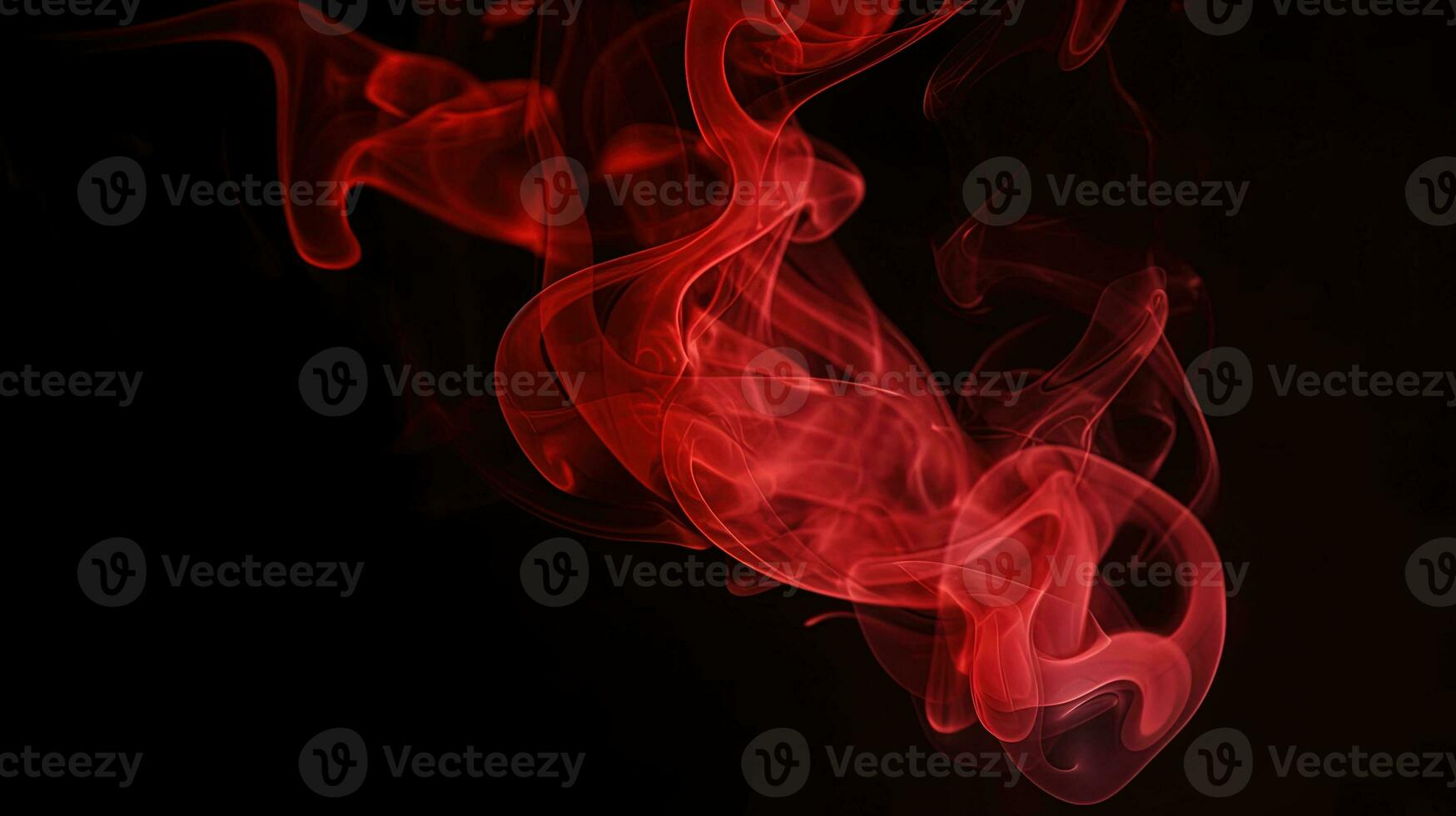 Red smoke on black background. Abstract colorful smoke on black background. photo