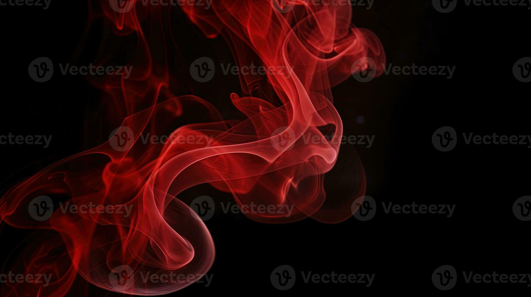 Red smoke on black background. Abstract colorful smoke on black background. photo