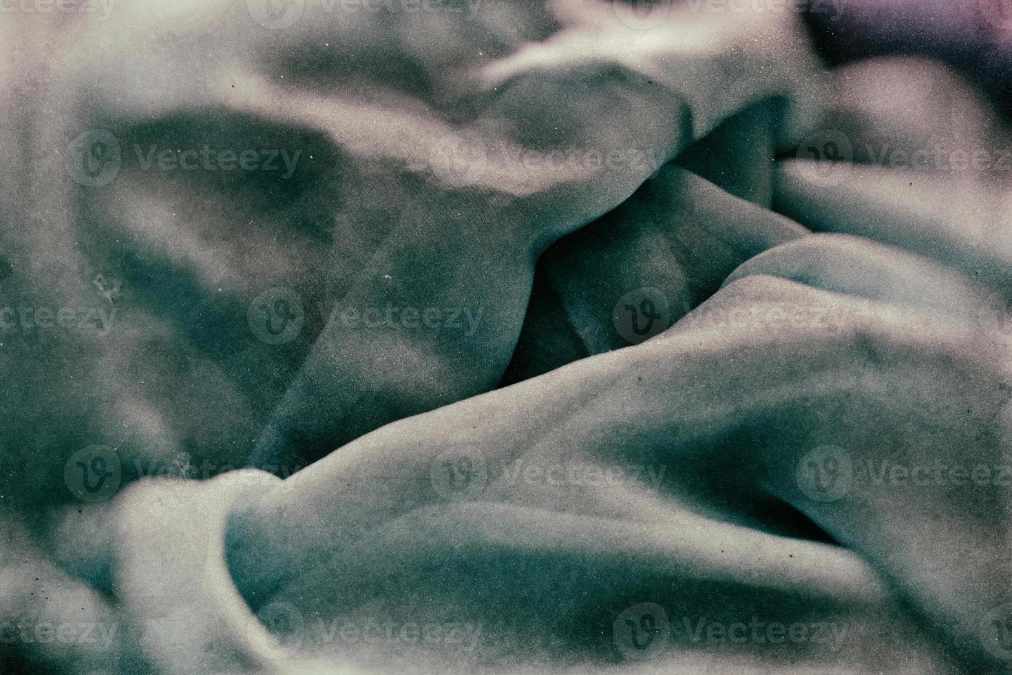 weird original abstract background with waves and grain forming waves photo
