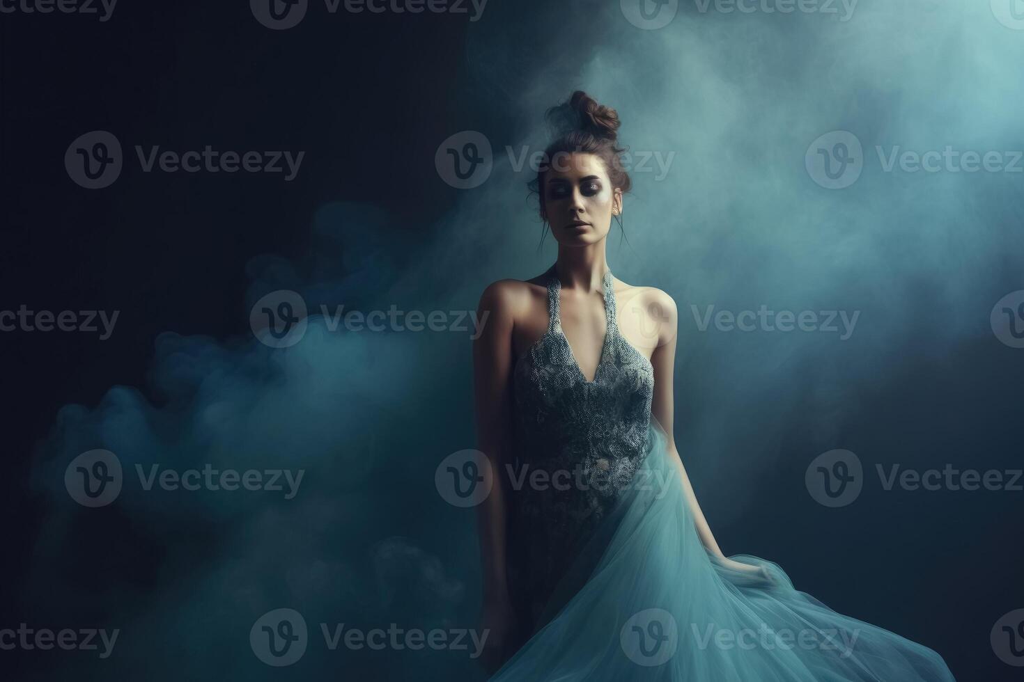 Gorgeous woman with an elegant dress and some smoke created with technology. photo