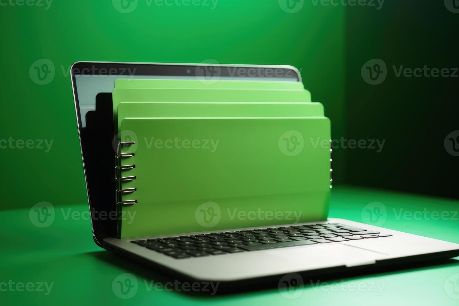 File folder on laptop screen with a green background created with technology. photo