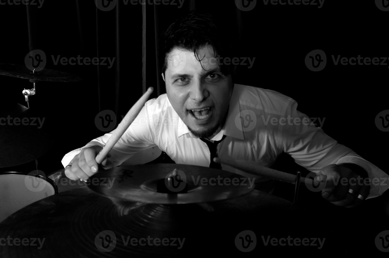 Man playing drums photo