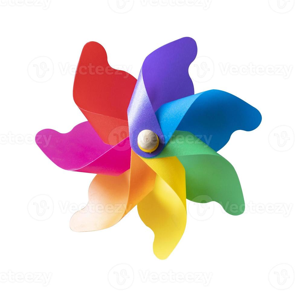 Colorful toy windmill on white background photo