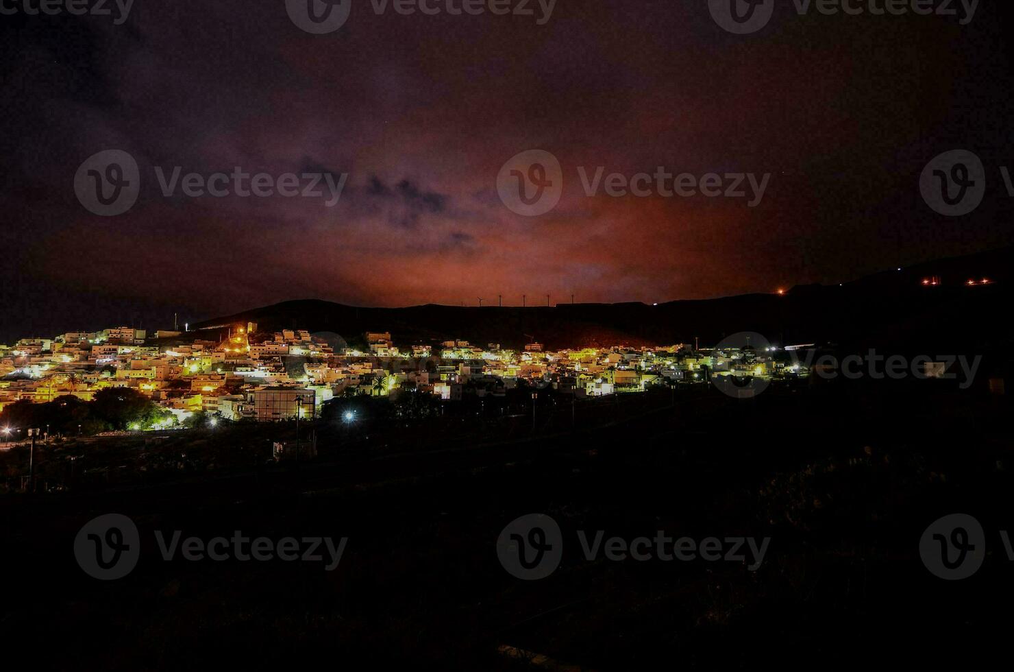 A cityscape at night photo