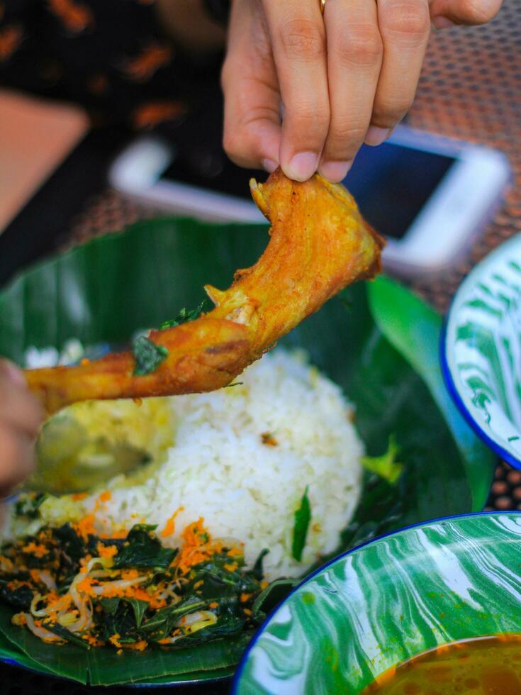 Fried chicken with rice on the plate. asian style food. photo