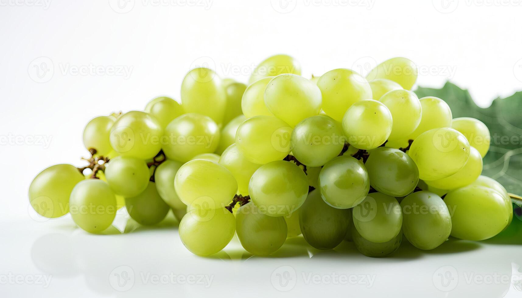 Branch of green grapes isolated on white background. photo
