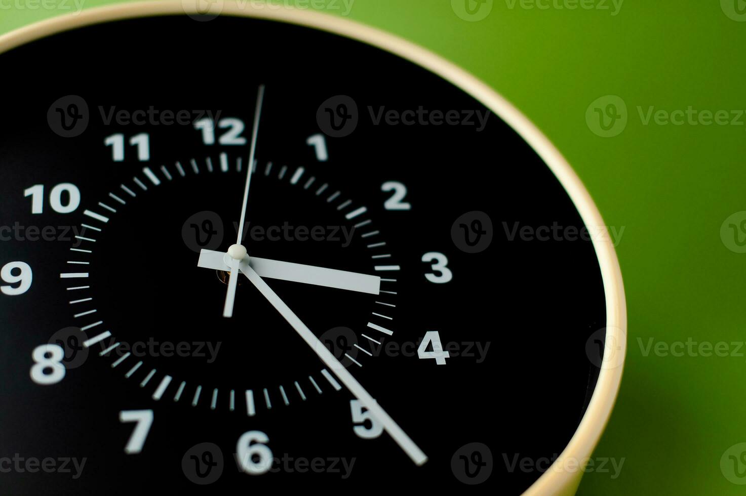 alarm clock on green background time concept working with time precious time photo