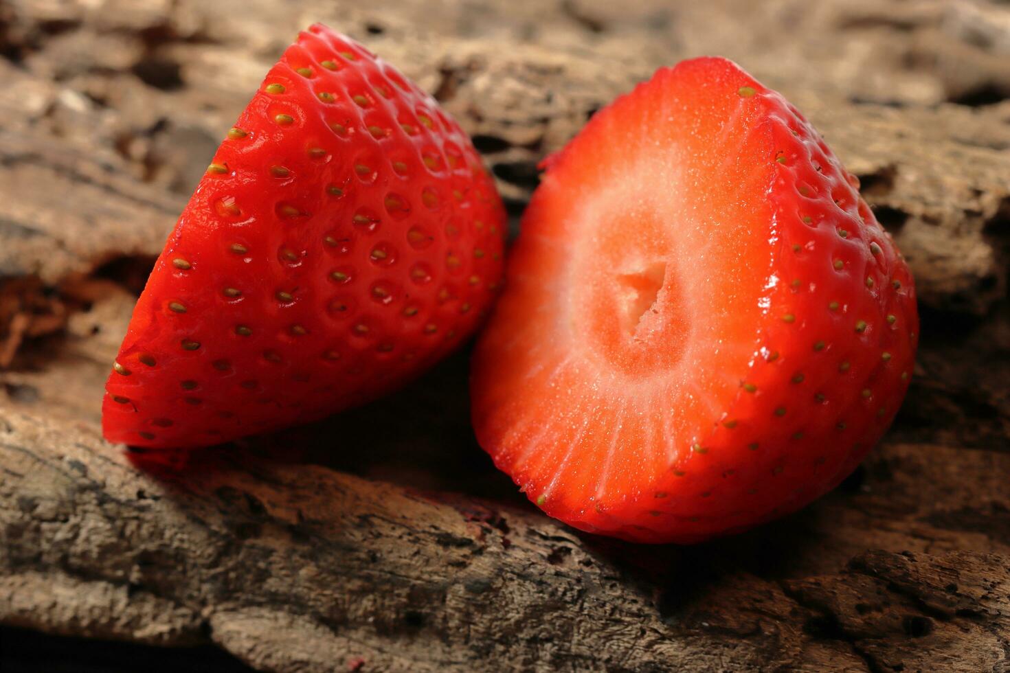 Fresh strawberry close up with slices photo