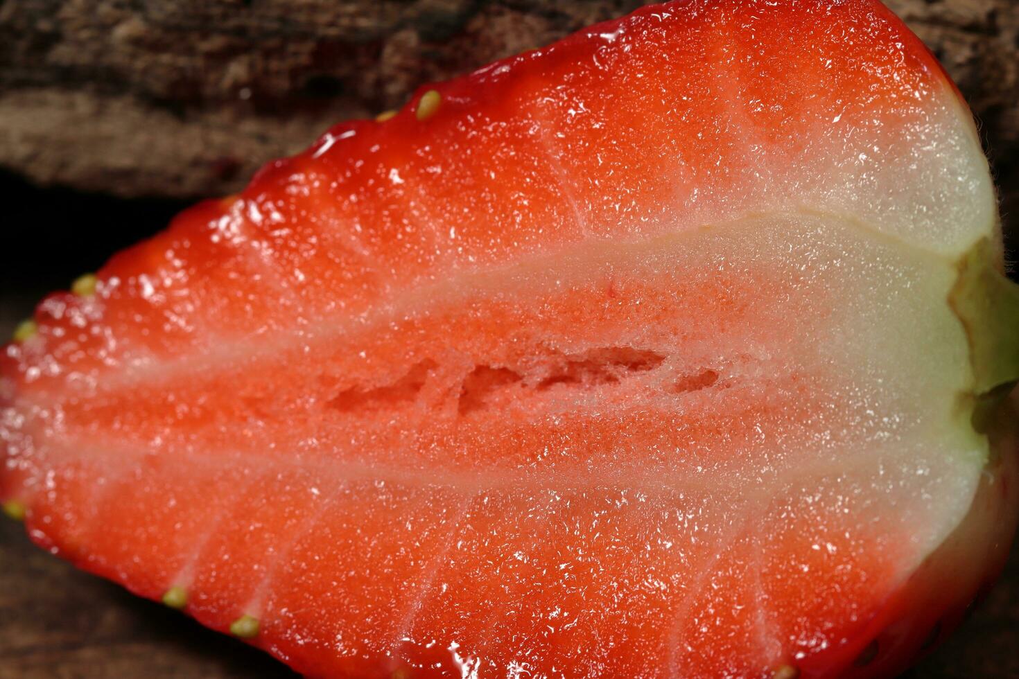 Fresh strawberry close up with slices photo
