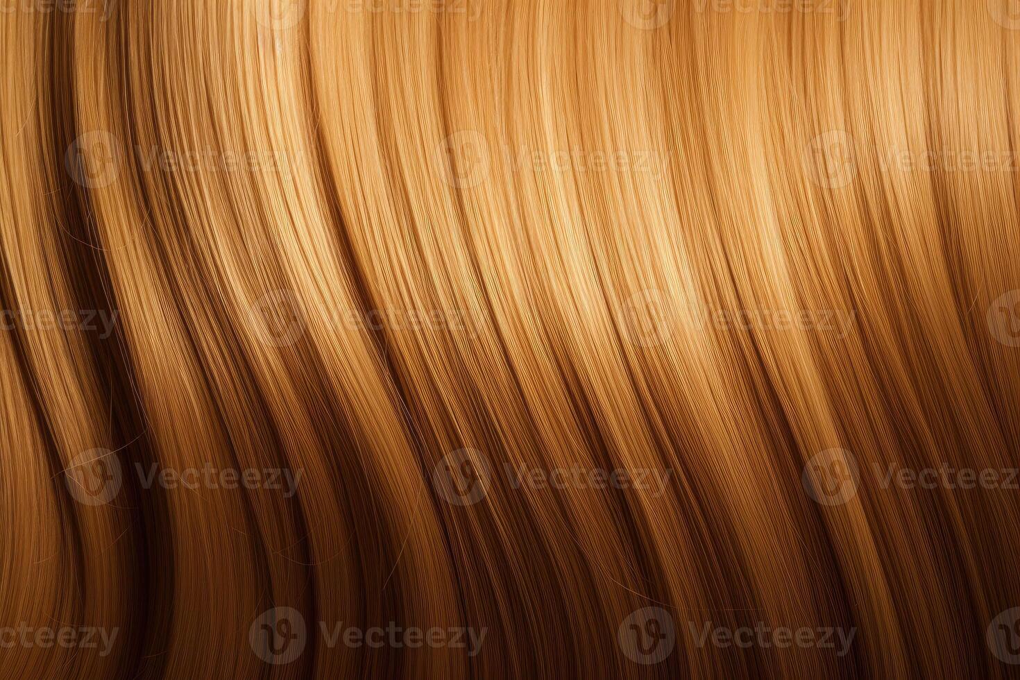 Beautiful caramel honey hair background. Healthy smooth shiny hair. photo