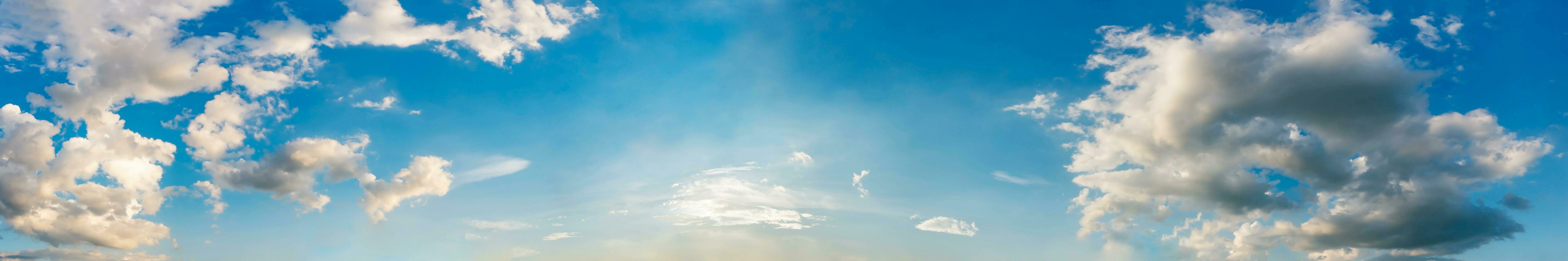 Blue sky panorama with cloud on a sunny day. Beautiful 180 degree panoramic image. photo