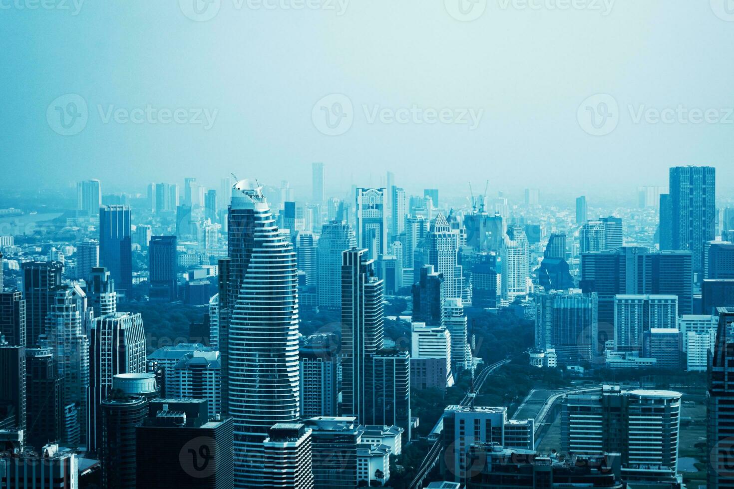 View of skyscrapers in the business district of the capital city. Bangkok, Thailand. With copy space and text design for business. photo