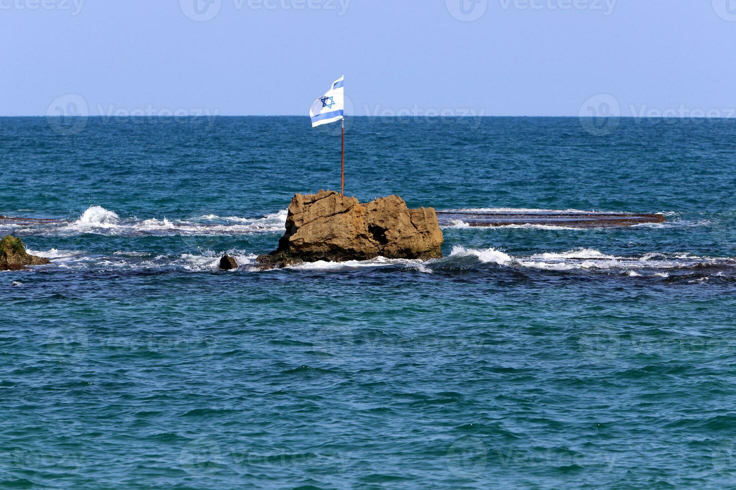 The blue and white flag of Israel with the six-pointed Star of David. photo