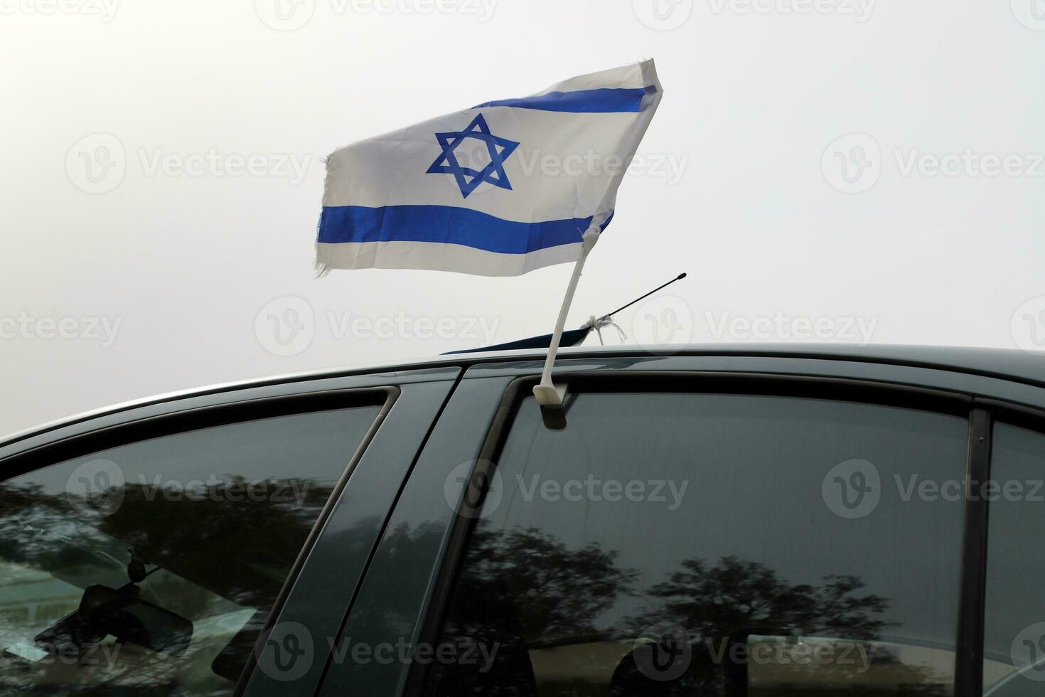 The blue and white flag of Israel with the six-pointed Star of David. photo