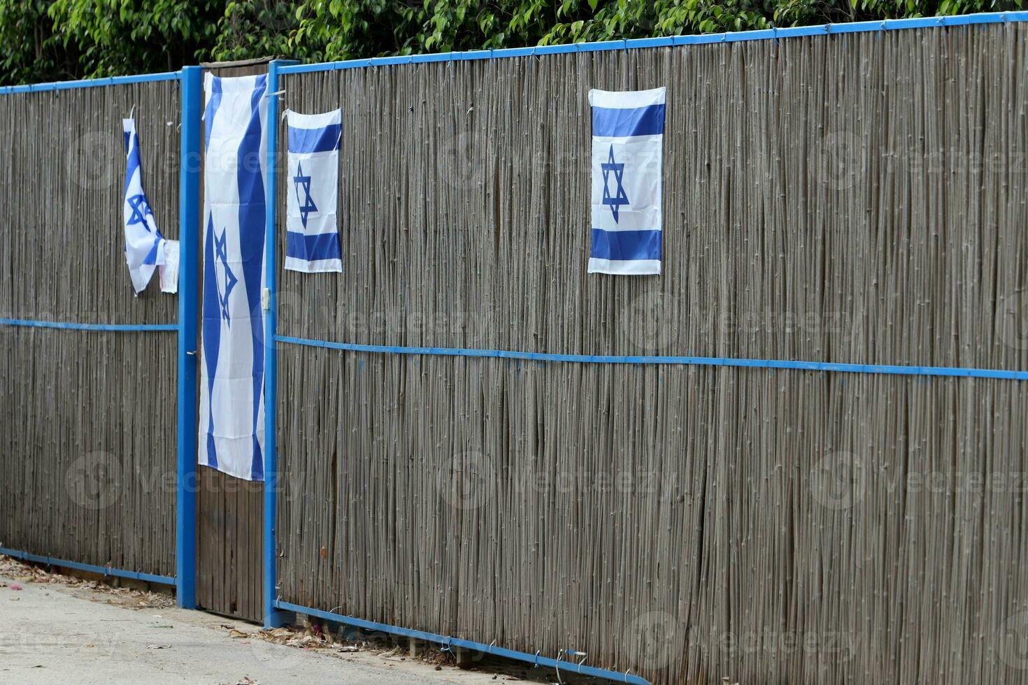 The blue and white flag of Israel with the six-pointed Star of David. photo