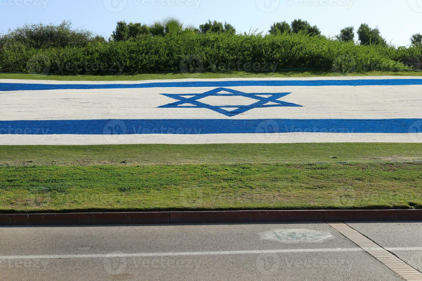 The blue and white flag of Israel with the six-pointed Star of David. photo