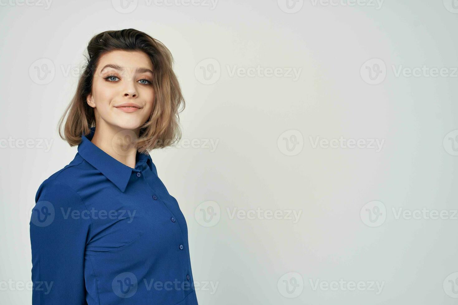 Business woman in blue shirt moda Studio isolated background photo