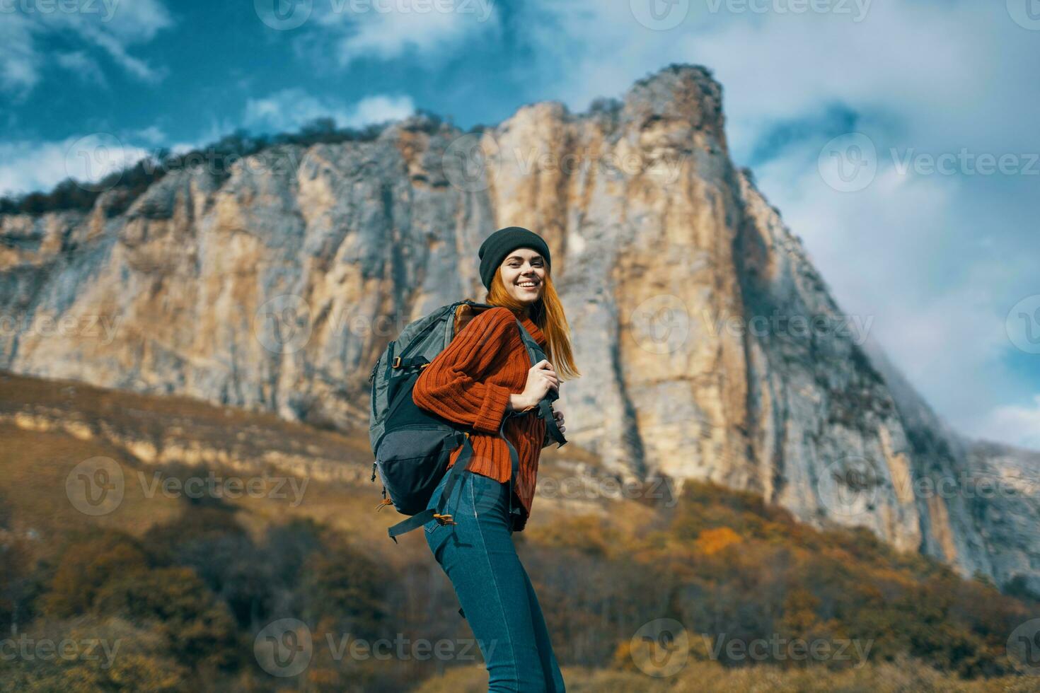 cheerful woman hiker nature landscape rocky mountains travel photo