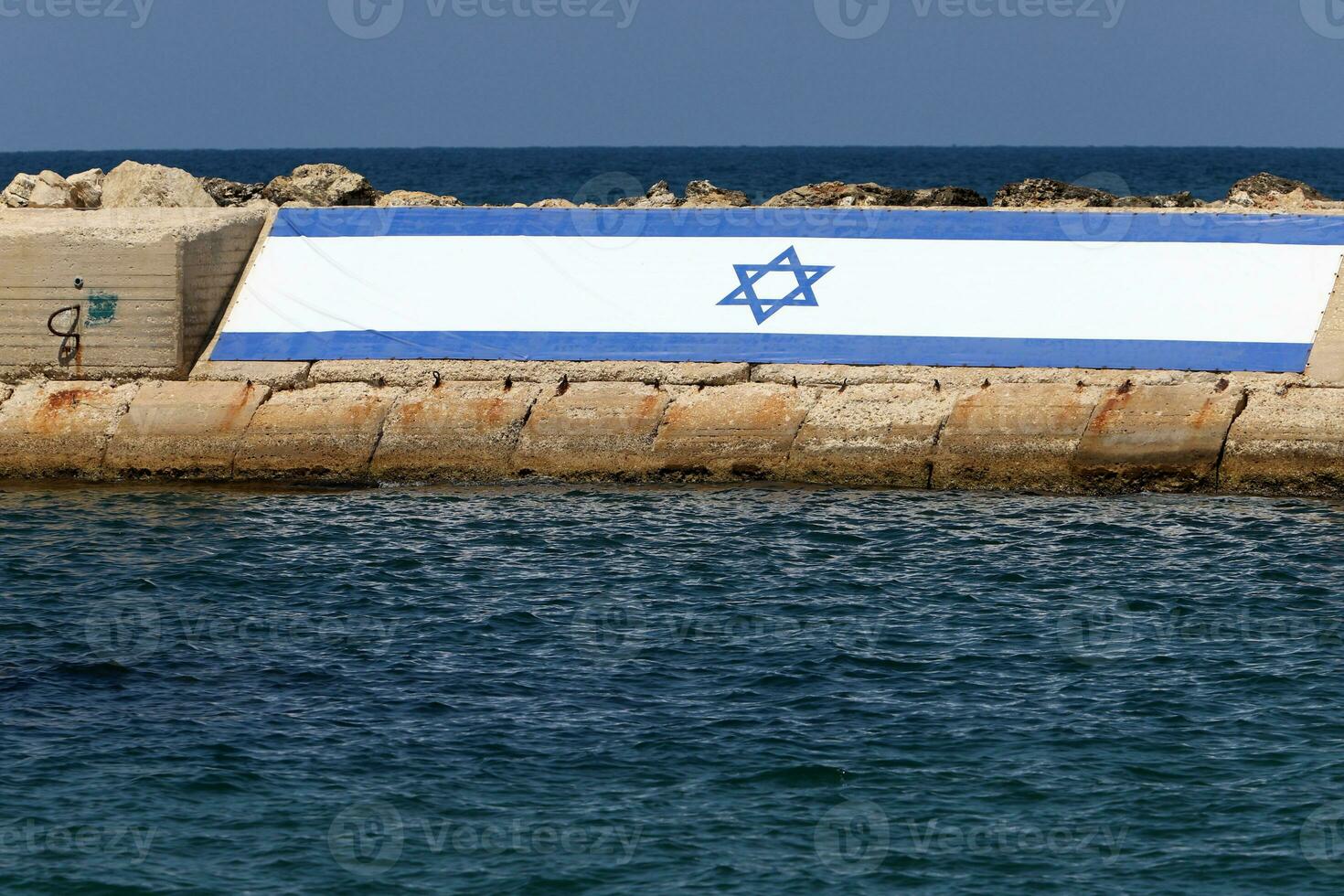 The blue and white flag of Israel with the six-pointed Star of David. photo