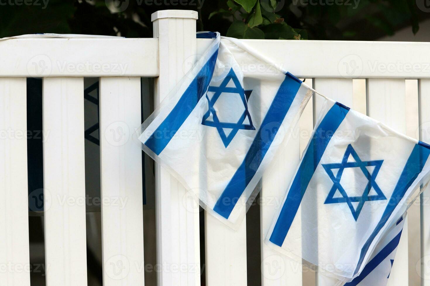 The blue and white flag of Israel with the six-pointed Star of David. photo