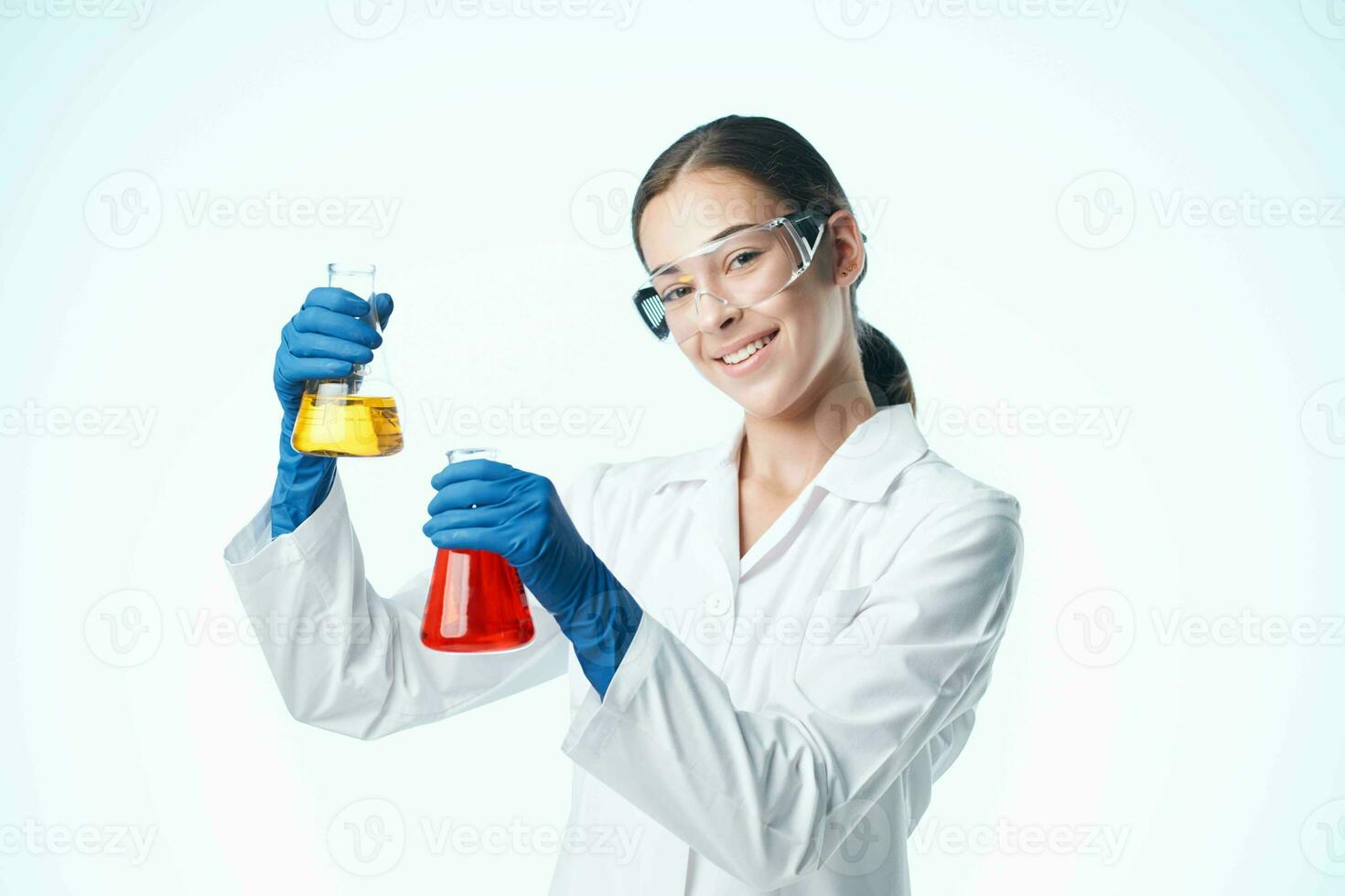 female scientist chemical solutions laboratory professional analyzes photo