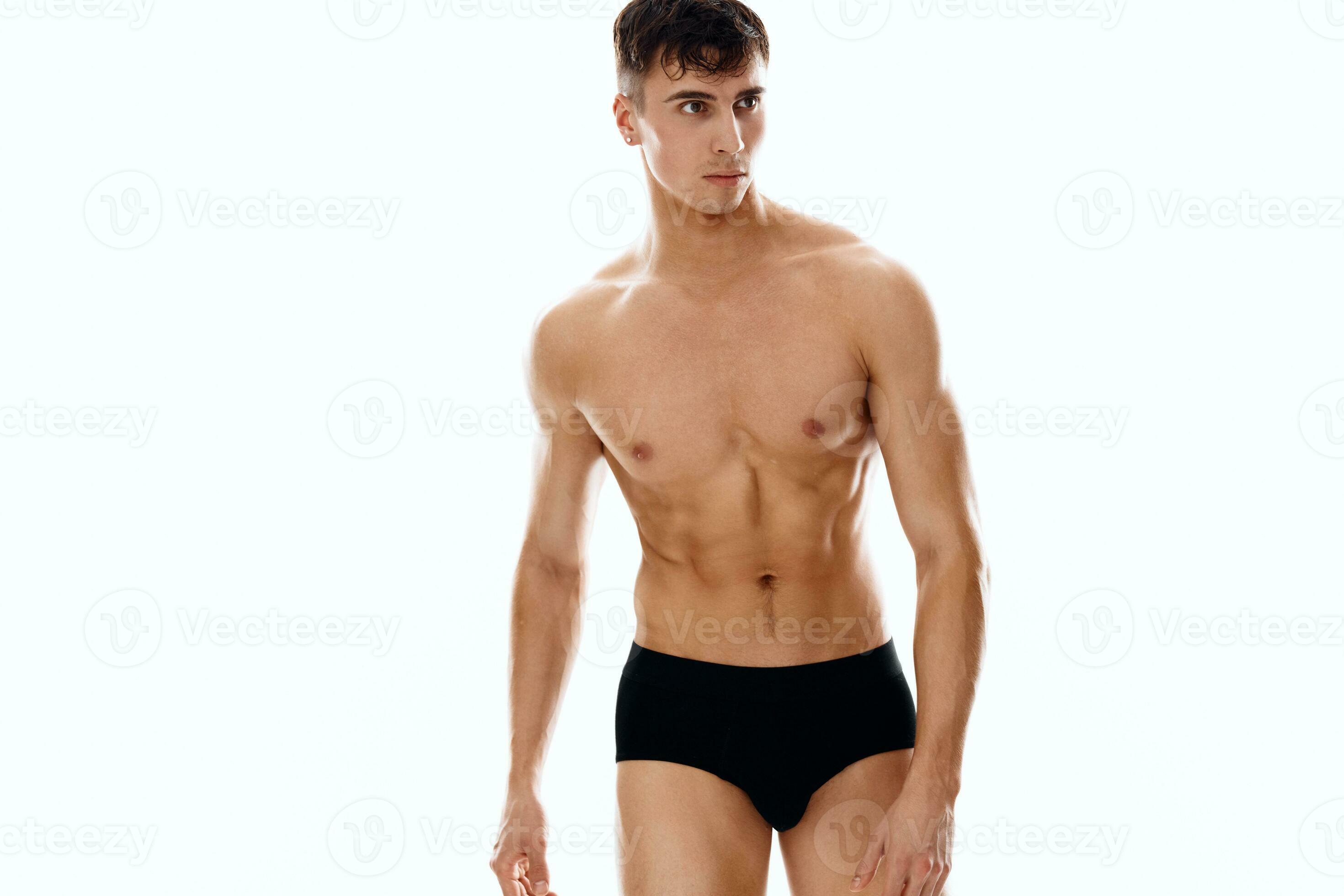 sporty man with naked body dark panties isolated background 23239685 Stock  Photo at Vecteezy